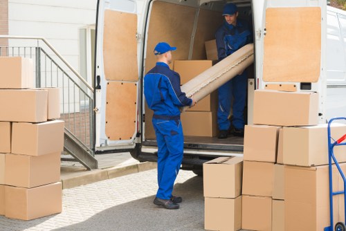 Moving boxes and household items prepared for an international removal to Italy