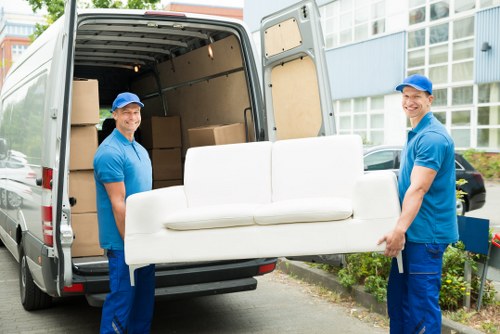 House removals planning in Italy with moving boxes and transport setup