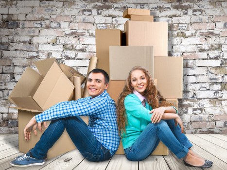 House removalists transporting belongings through an Italian street