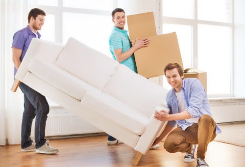 Professional office relocation services in Italy with moving boxes and office equipment