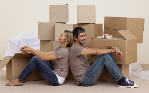 Small moving van handling furniture transport in Italy