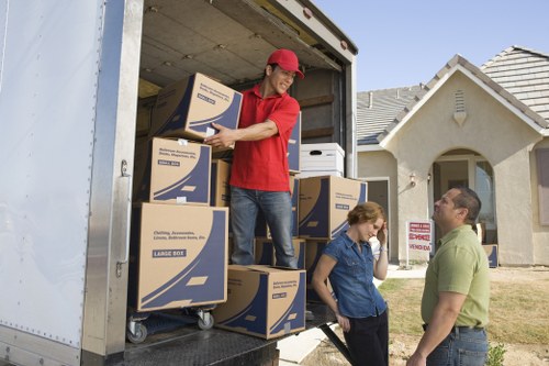 Transparent Italy removals pricing with a moving truck and packed household items
