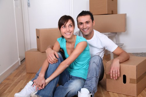 Professional movers loading a van for urgent relocation in Italy