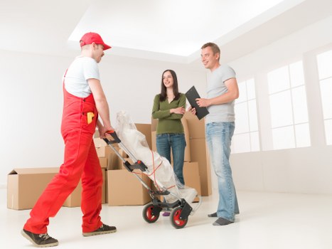 Packed boxes and furniture ready for a student move in Italy