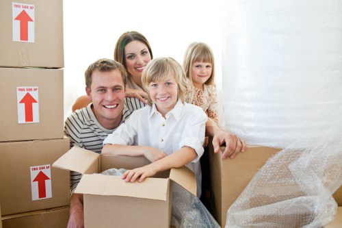 Movers arranging home furniture during a relocation in Italy