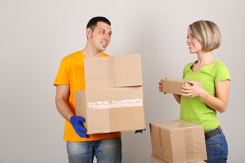 Packed moving boxes and furniture ready for international relocation to Italy