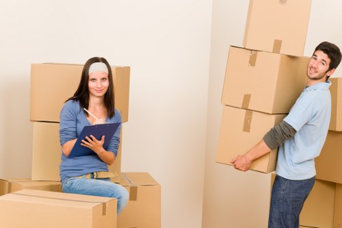 City apartment moving logistics in Italy with boxes and protective packing