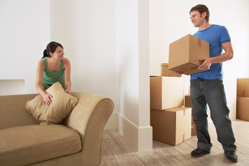 Moving van in Italy with furniture and packed boxes