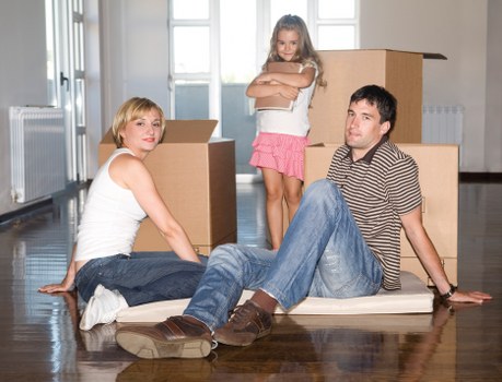 Professional movers loading student items into a van in Italy
